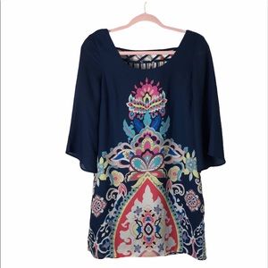 Boho, bell sleeve, lattice back dress.